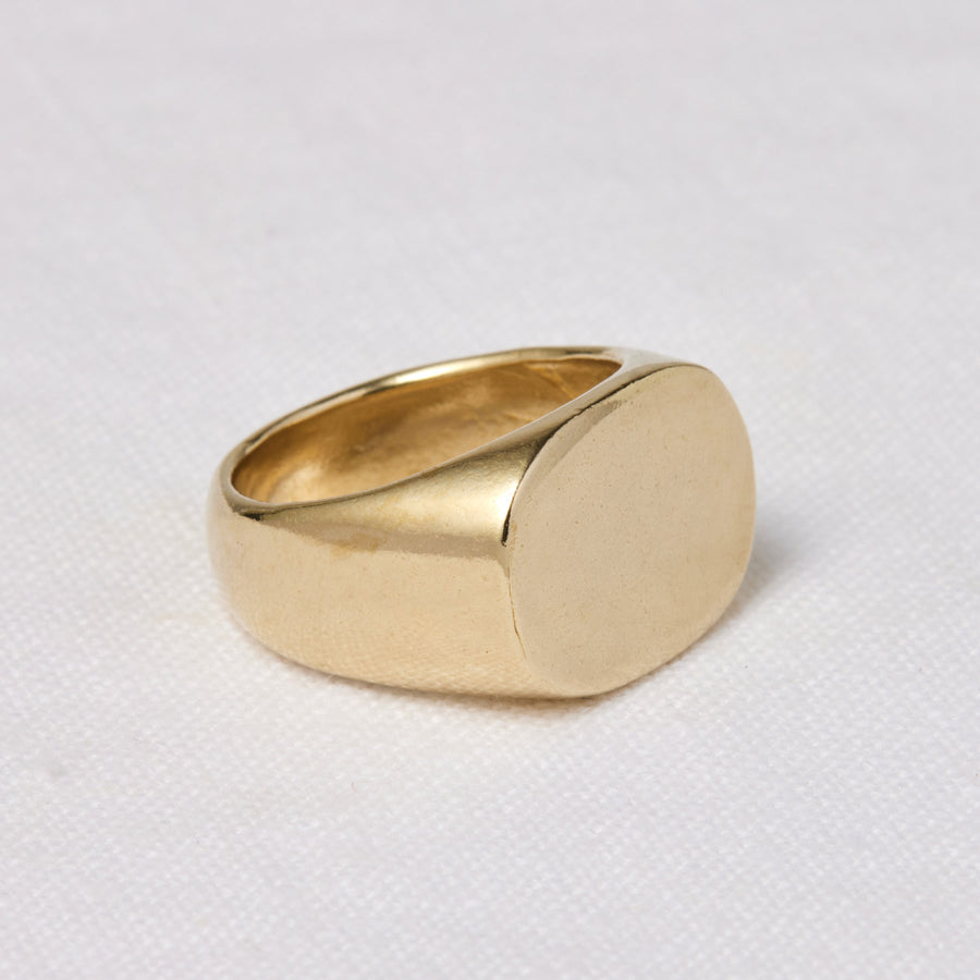 Oval faced signet ring with wide chunky band that tappers at the back-Marisa Mason