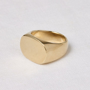 Oval faced signet ring with wide chunky band that tappers at the back-Marisa Mason