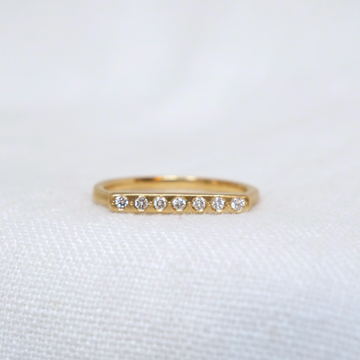 thin 14k signet band has a skinny flat face, perfect for the 7 round white diamonds to be set in a row-Marisa Mason