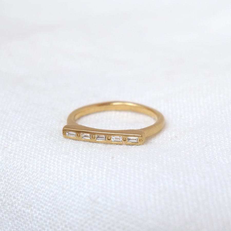 thin 14k signet band has a skinny flat face, perfect for the 5 Baguette cut white diamonds to be set in a row-Marisa Mason