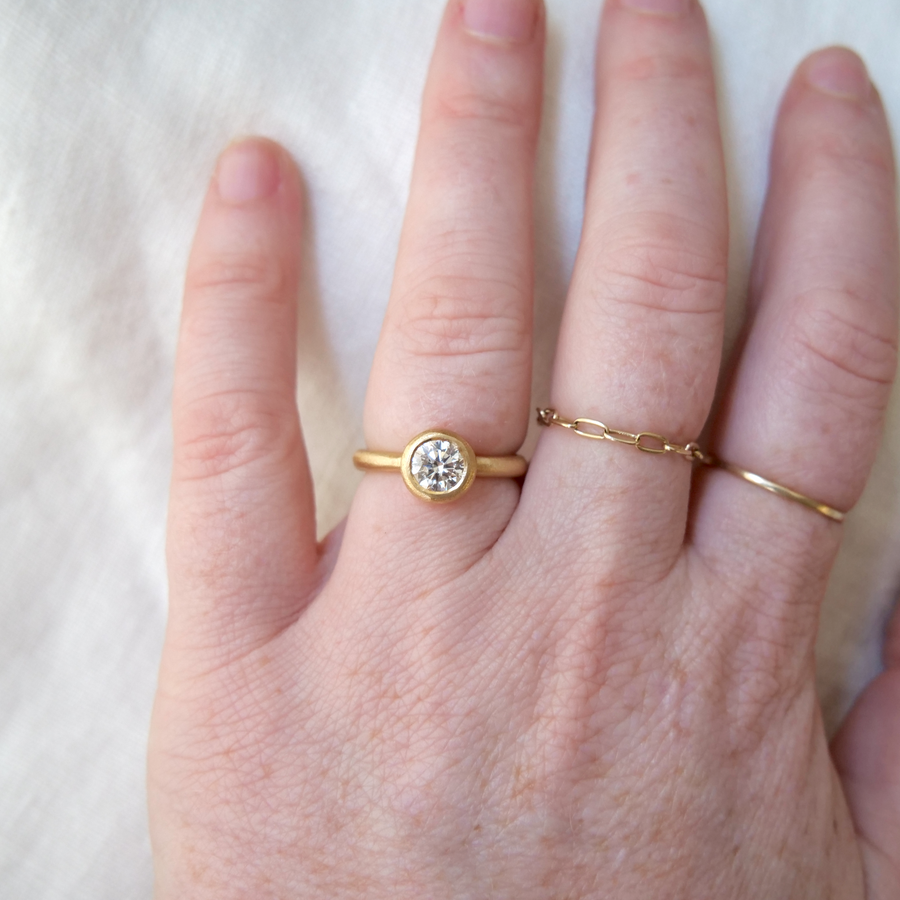 Engagement ring solitaire ring bezel set white diamond Marisa Mason Jewelry 