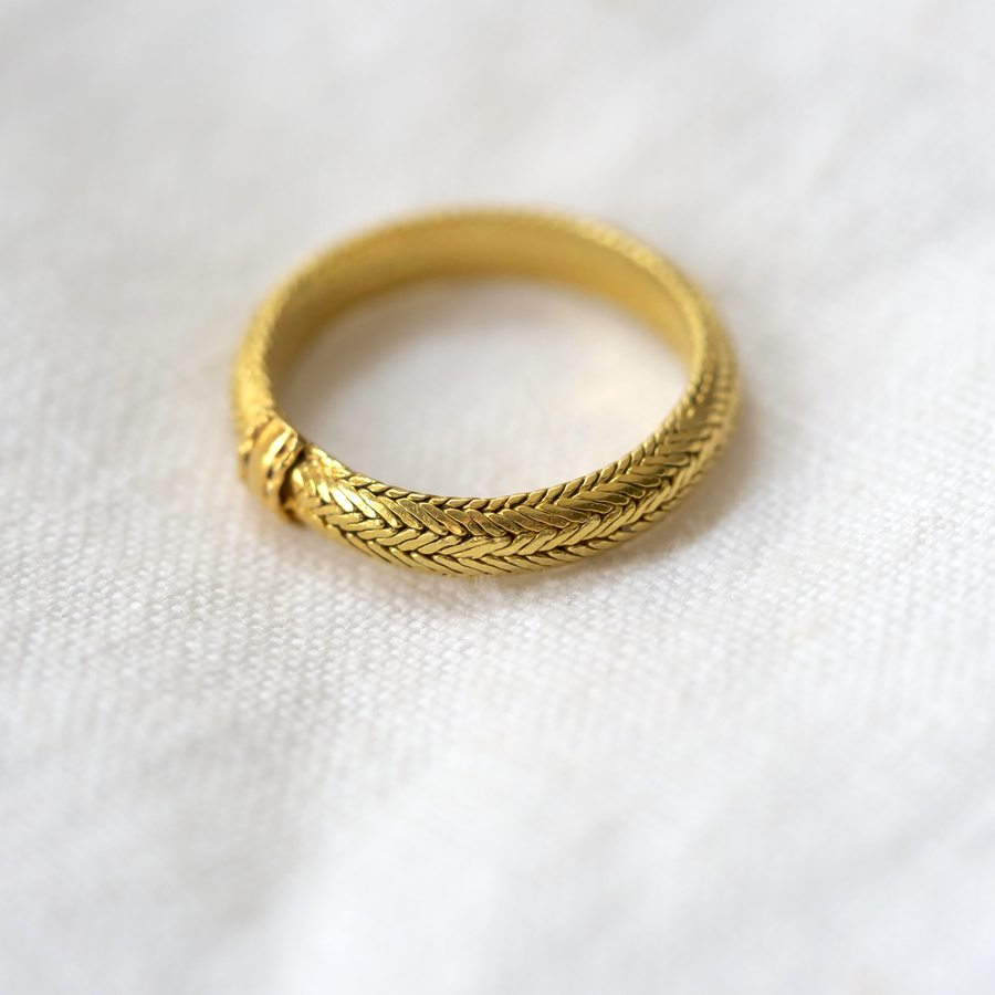 These rings are made of luscious 18K gold wire, woven into a slightly flexible bands