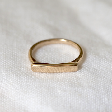 sleek 14k ring has a perfectly engravable smooth face.