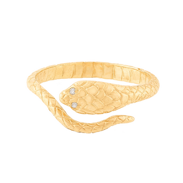 Gold Cobra Ring wraps around the finger, with the end of the tail meeting the head with its two white diamonds as eye