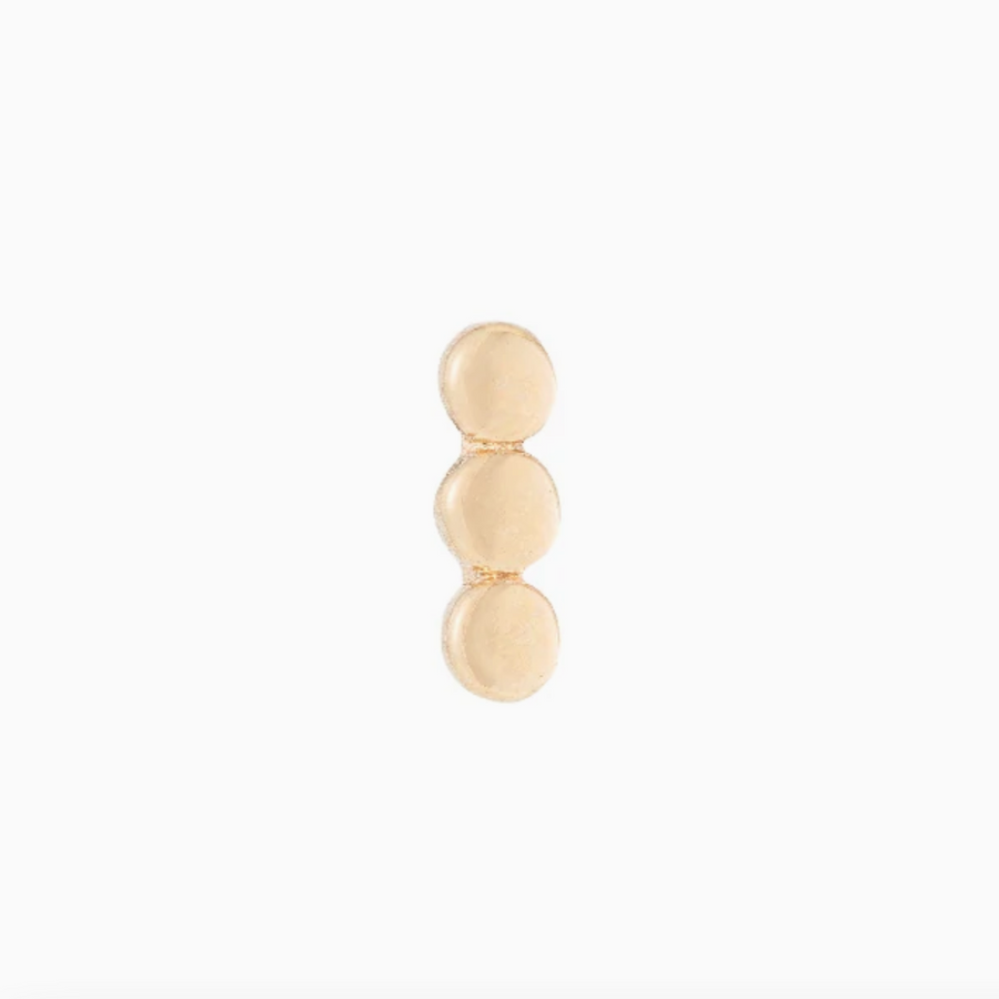 Three round gold dots in a row, creating a bar earrings stud