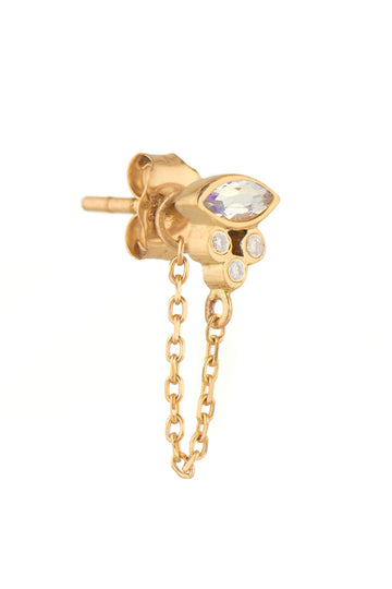 gold earring with chain and moonstone and diamonds on white background
