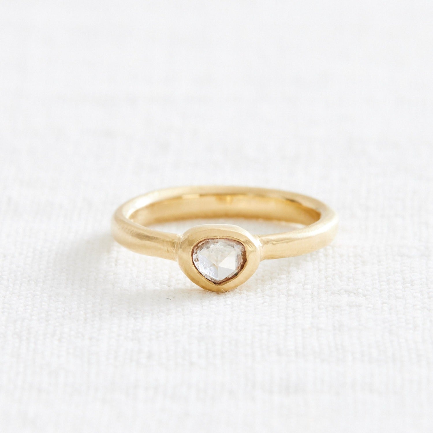 gold ring with organically shaped diamond 