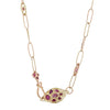 This exquisite piece features a variety of Rubies delicately placed on a hand-crafted textured chain, complemented by textured cast links