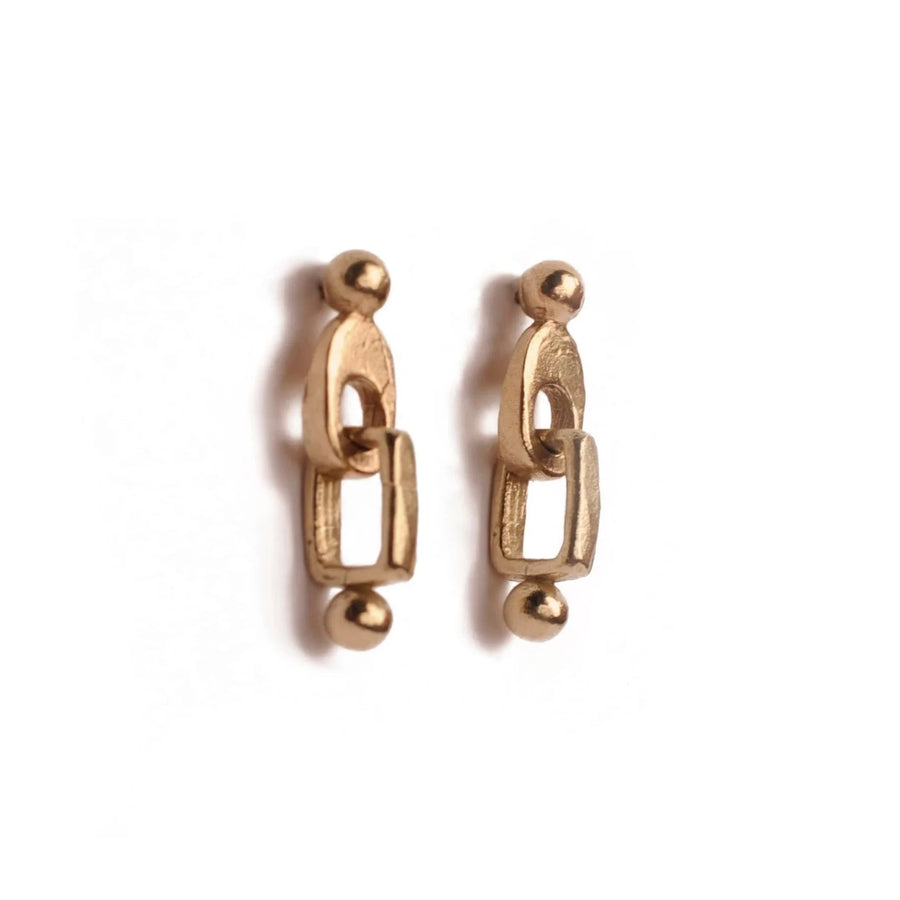 Rectangles, circles, ovals, and spheres all come together to form these hand crafted linked earrings