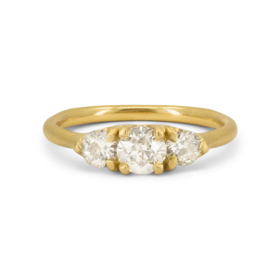 Rich 18k yellow gold holding 3 brilliantly gleaming Old European Cut White Diamonds
