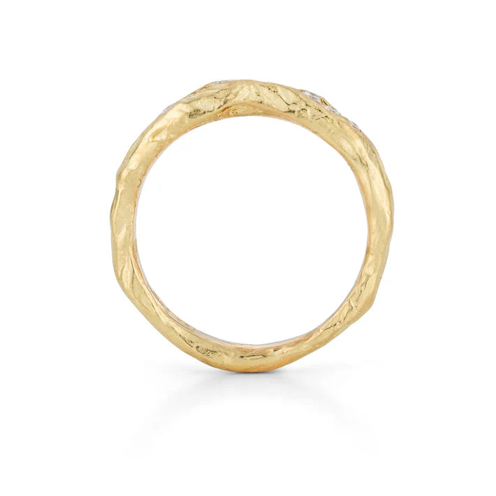 Organic gold band with ten white diamonds inset in the band