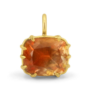 A beautiful peachy gradient showcased in this one of a kind Oregon Sunstone set in an East-West oriented hand fabricated 18k yellow gold basket setting. 