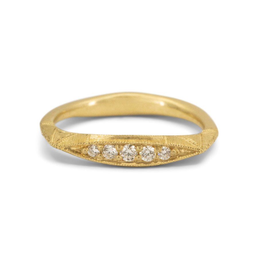 A perfect everyday staple in your collection, displaying one of a kind hand engraving and a delicate flash of Pave White Diamonds. 