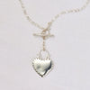 4 of 6: Silver Necklace made of round link chain with toggle clasp, with heart pendant the drops down - Marisa Mason Jewelry