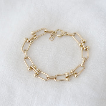 U-link Gold bracelet on a white background