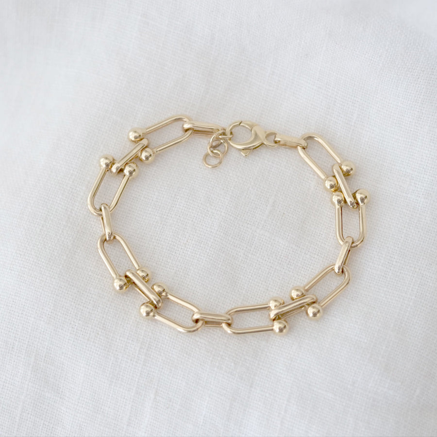 U-link Gold bracelet on a white background