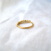 8 of 9: Soft blue Montana Sapphires, bezel set in a simple yellow gold band