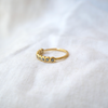 7 of 9: Soft blue Montana Sapphires, bezel set in a simple yellow gold band