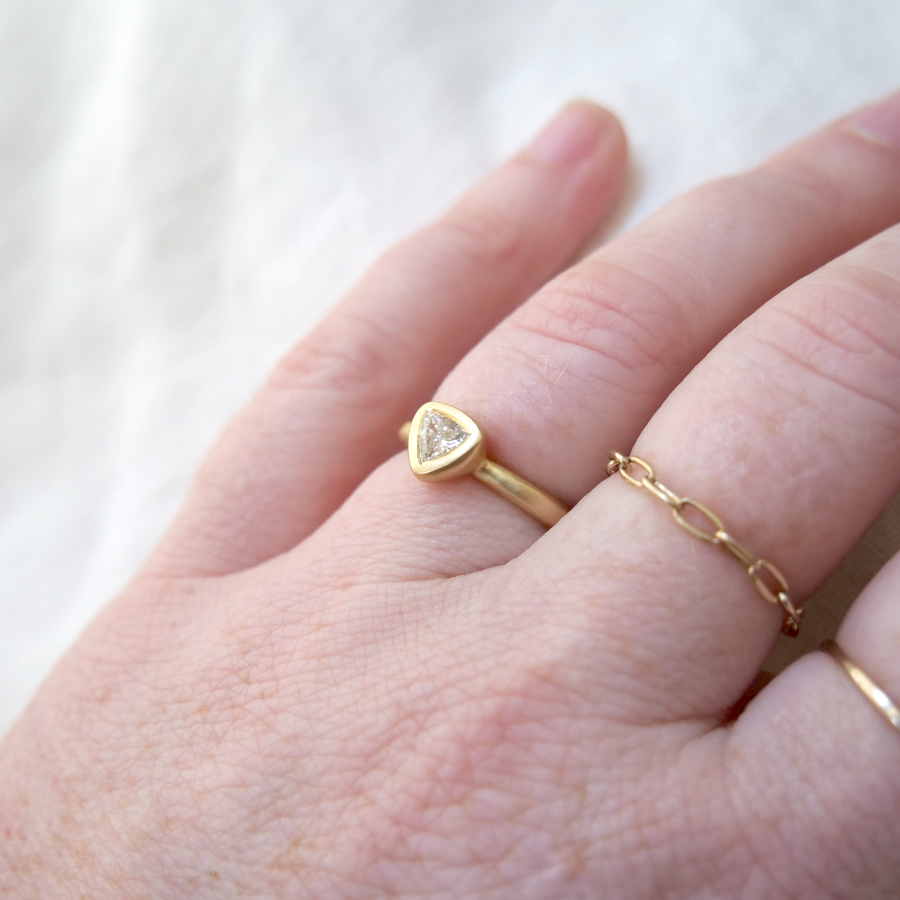 Trillion white diamond in 18k gold bezel set ring engagement ring Marisa Mason Jewelry