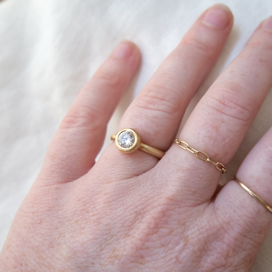 Engagement ring solitaire ring bezel set white diamond Marisa Mason Jewelry 
