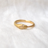 Gold band snake around finger ouroboros ring 18k gold white diamonds Marisa Mason Jewelry