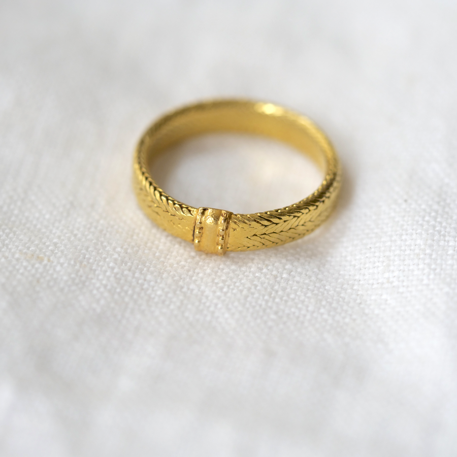 These rings are made of luscious 18K gold wire, woven into a slightly flexible bands