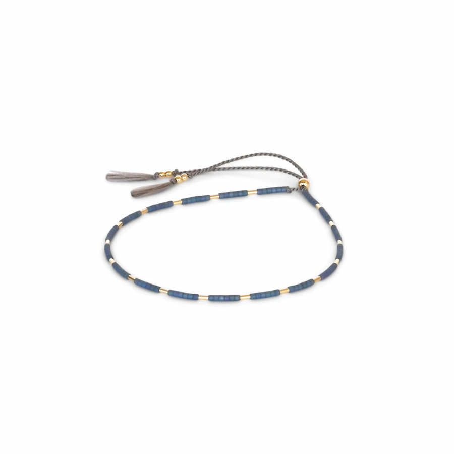 Thebe features matte glass beads in the five available collection colors evenly interspersed with delicate gold-filled beads. Thebe is available in two adjustable bracelet size