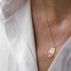 2 of 2: Celine Daoust 14k light yellow gold with white diamonds Small Dharma's Hand Pendant Necklace.