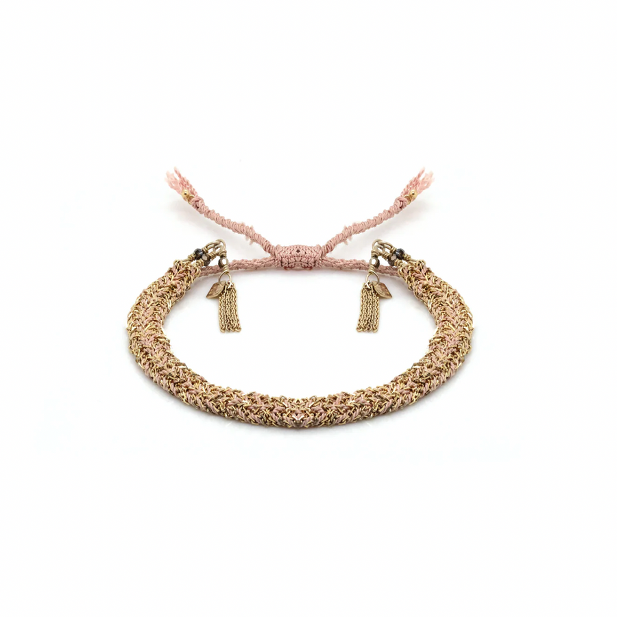 hand-braided bracelet has forçat Sterling silver chains and twisted beige color silk yarn finished by little chain fringe and tiny crystal beads. All parts are dipped in yellow gold. Sliding knot closure with 5 cm silk cord on both ends to adjust to any wrist.