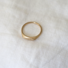 4 of 6: A oval face signet ring with a sweet little olive branch hand engraved on the front.