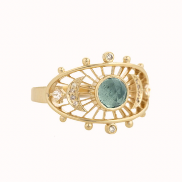 GOLD RING WITH ONE EYE BLUE TOURMALINE, TWO MOON CRESCENTS AND DIAMONDS.