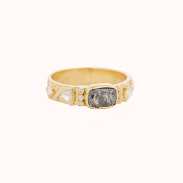 GOLD TOTEM RING WITH A CENTRAL GREY DIAMOND, DIAMONDS TRIANGLES, AND SIX DIAMONDS