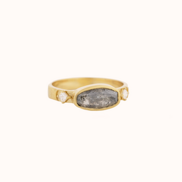  GOLD RING WITH A OVAL GREY DIAMOND, MOON DETAILS AND SQUARE DIAMONDS. 