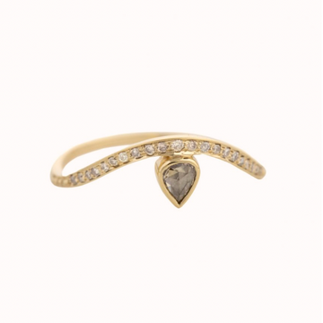 GOLD RING WITH A ROSE CUT GREY DIAMOND ON A GOLD WAVE WITH DIAMONDS.