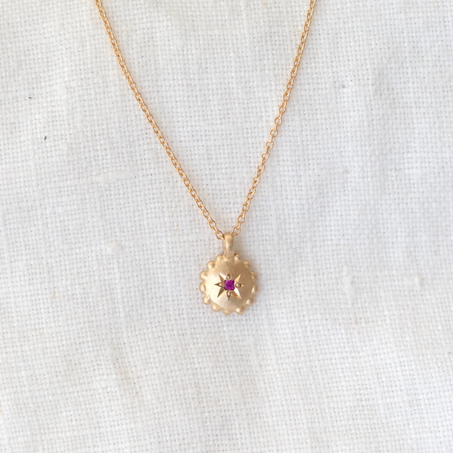  solid 14k gold sweet dotted pendant bead set with a ruby