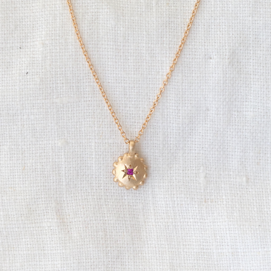  solid 14k gold sweet dotted pendant bead set with a ruby