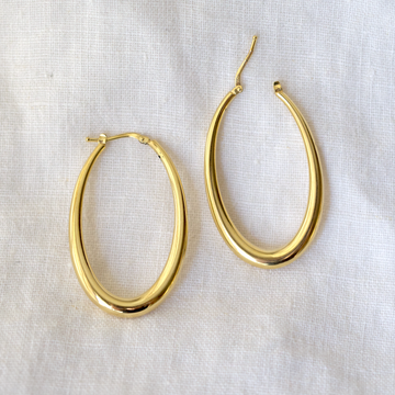 classic tube hoops- these hollow forms hang in an elegant oval, with a slight taper towards the clasp