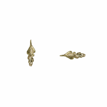 Hand Carved Fern Stud earrings available in 14k yellow gold.