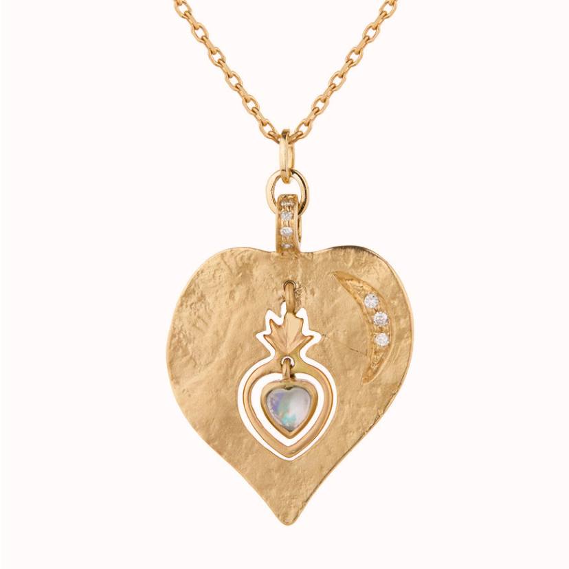 14K LIGHT YELLOW GOLD TWIN FLAME MEDAL WITH DANGLING HEART CARVED IN MOONSTONE AND DIAMONDS.