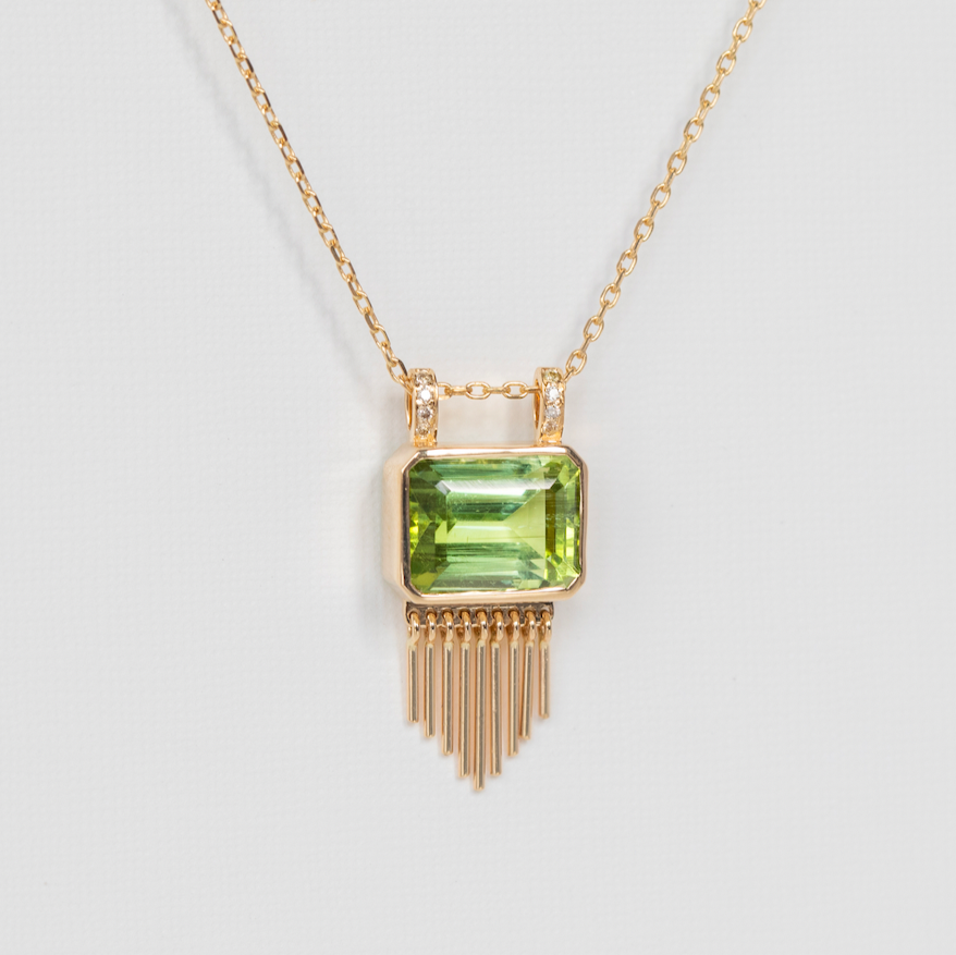 arge geometric tourmaline with the delicate fringe and diamond detailing 