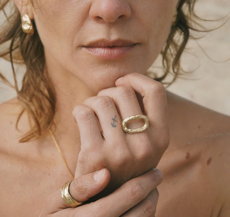 brass ring on model's hand