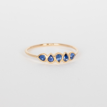 Multi small rosecut tanzanite stones set in 14k yellow gold