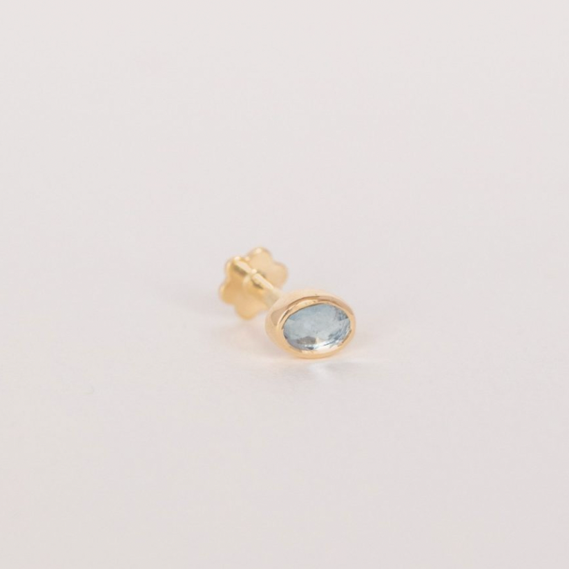 14K LIGHT YELLOW GOLD PIERCING WITH A ONE OF A KIND AQUAMARINE STONE