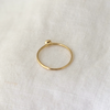 5 of 5: lightweight 14k gold band with a gorgeous 2.5mm white diamond bezel set in the center