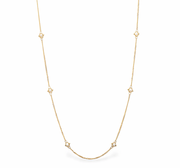 Pearl accents along this shimmering 18k gold chain give a sense of simple elegance