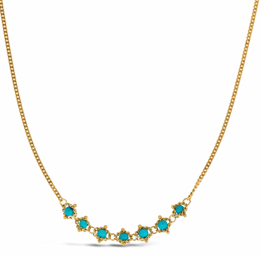 This hand woven necklace features a row of Turquoise stones reminiscent of tiny robin’s eggs cradled in golden nests.