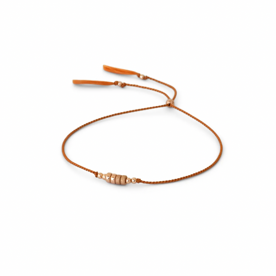 simple BROWN silk cord bracelet adorned with smooth and shimmery textured 14k rose gold-filled beads.