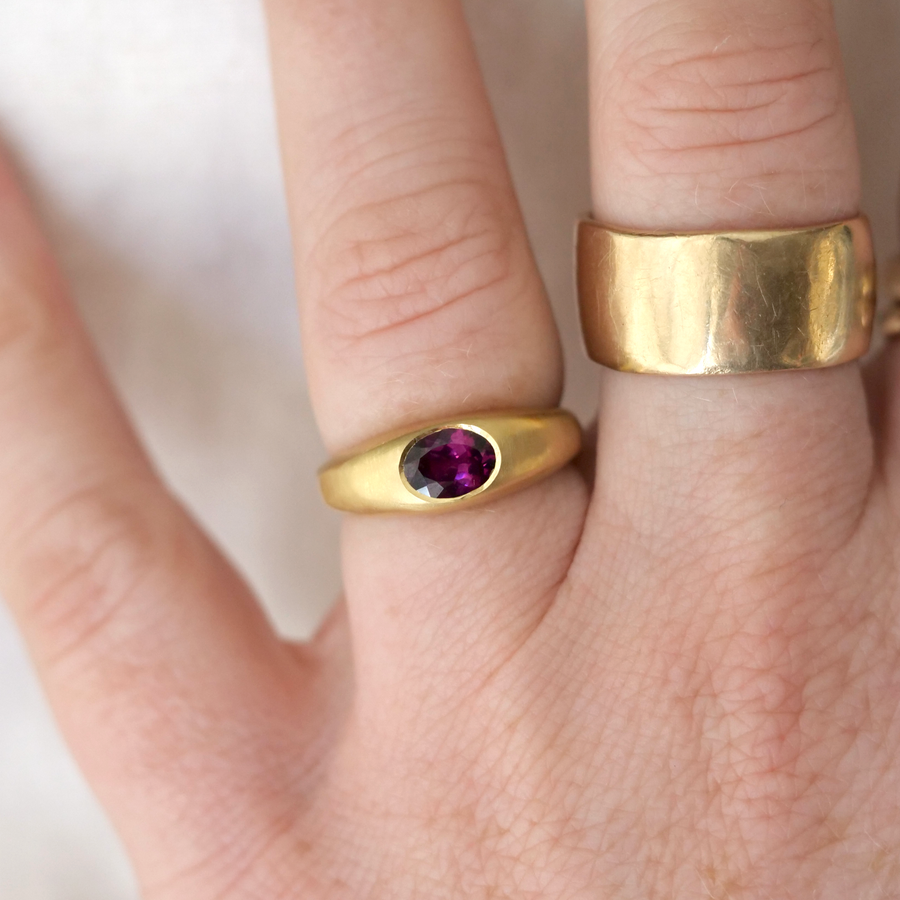 This rich Indian garnet is bezel set in our new and improved Helena band, a 