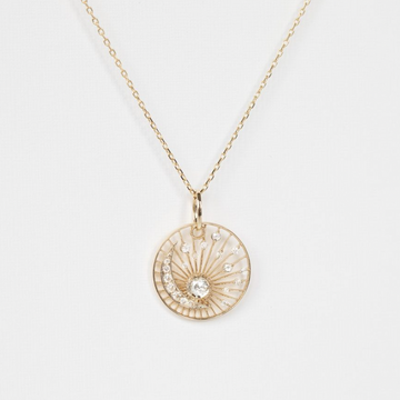 yellow gold dream maker pendant oval diamond with moon crescent details and marquise diamond necklace.