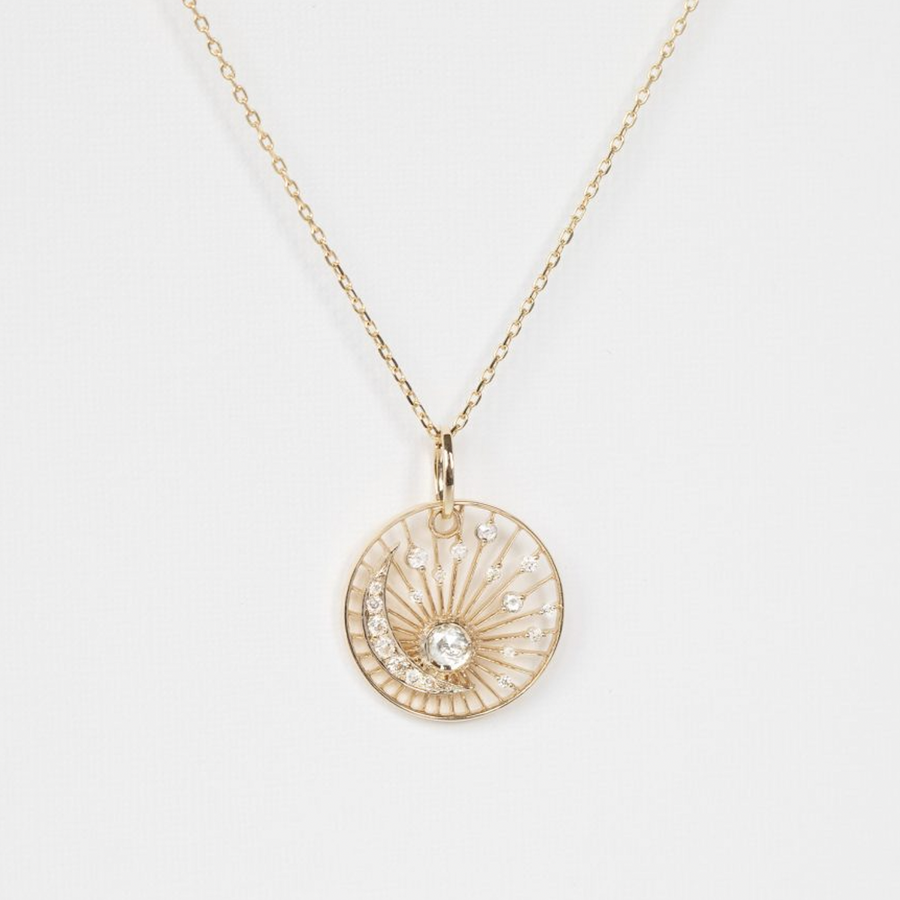 yellow gold dream maker pendant oval diamond with moon crescent details and marquise diamond necklace.